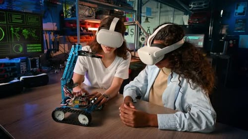 Young Adults Working With VR Robotics in Lab