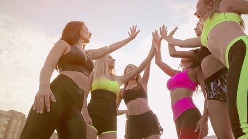 Fit Women High Five After Workout