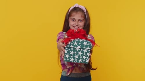 Lovely Smiling Preteen Child Girl Kid Presenting Birthday Gift Box Offer Wrapped Present Celebrating