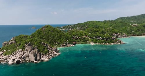 Calm Coastal Waters and Vibrant Tropical Greenery Koh Tao Thailand