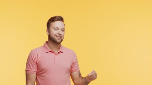 Expressive Young Man Over Vibrant Background Studio Portrait of Handsome Person