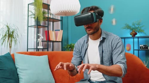 Man Experiencing Virtual Reality at Home