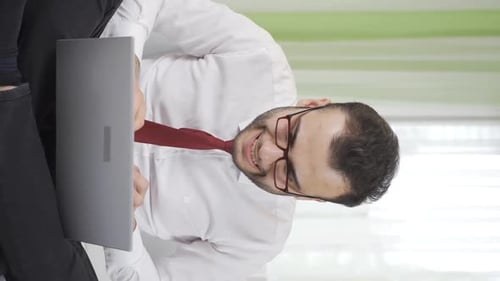 Vertical Video of Stressed businessman is working in his home office.