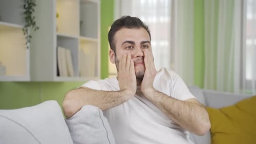 Nervous and stressed young man.