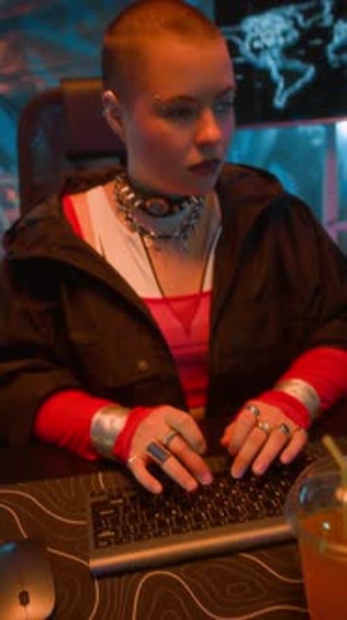 Woman Working at her Desk in the Evening