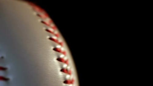 Baseball Ball Isolated on Black Background/Red Seam on White Ball/Sport Ball Close