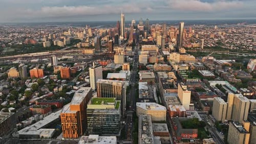 An aerial view of a city with tall buildings