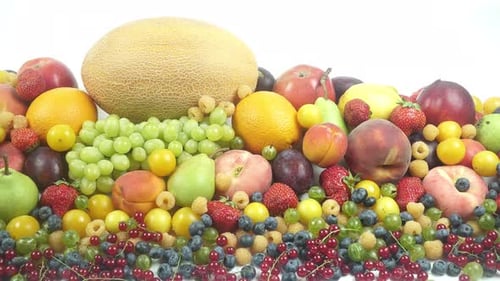 Colorful Variety of Fresh Fruit on a White Surface