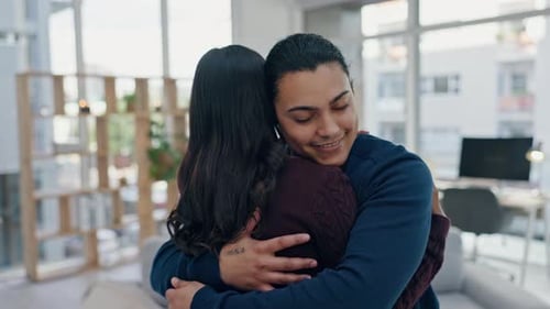 Affectionate Couple Embracing in Bright Apartment