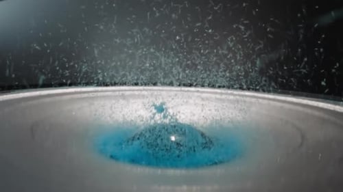 Close Up of Water Bouncing on Speaker