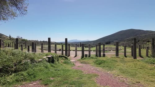 Columns Of Archaeological Site Of Ancient Messini In The Peloponnese Peninsula In Greece. Aerial Wid