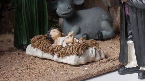 Baby Jesus in the Manger: A Nativity Scene Close-Up