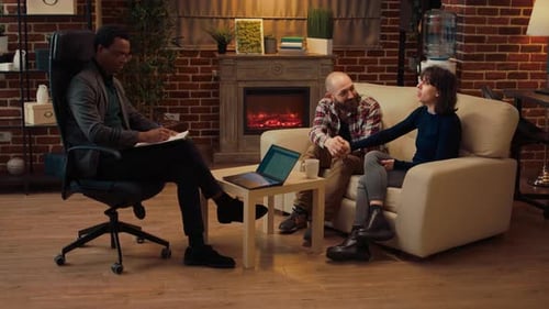 Couple in Therapy Session Talking with Therapist