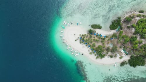 Colorful Tour Boats Moored Around Pass Island Sandbank in Coron, Aerial