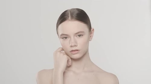 Young Woman Posing in a Studio for Skincare