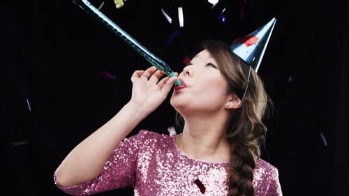 Party, confetti and woman in celebration of birthday or festive holiday with a hat