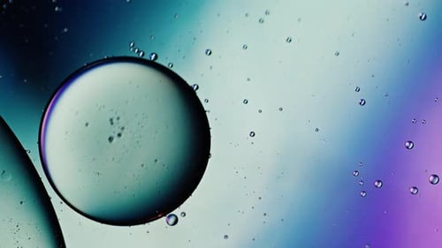 Abstract Colorful Organic Food Oil Drops Bubbles On Water Surface 003