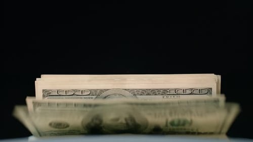 Money Counting Machine Counts Hundred Dollar Bills