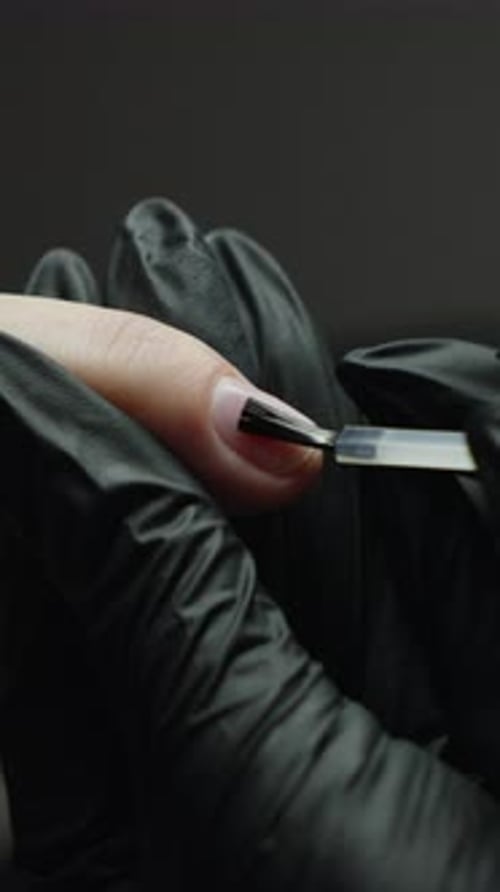 Clear Nail Polish Being Applied to Nail