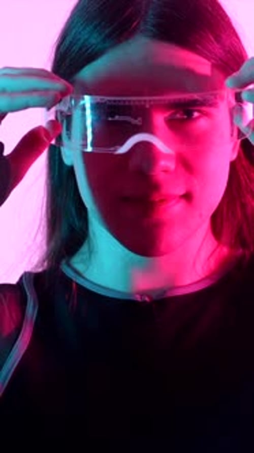 Futuristic Studio Portrait with Neon Lights of a Transgender Person
