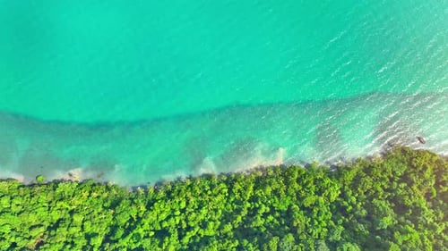An aerial view reveals the beauty of a tropical island in Thailand. 4K.