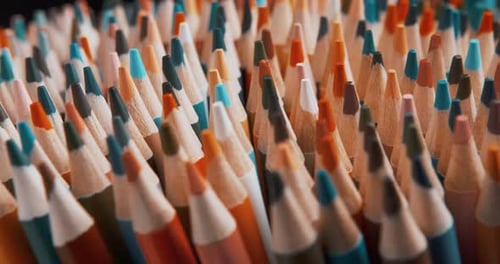Closeup of Sharpened Colored Pencils Spinning in a Circle