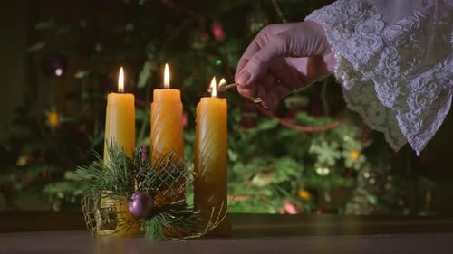 Candles are burning in romantic Christmas evening, celebrating New Year holidays