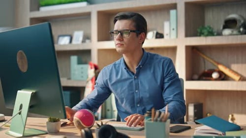 Thoughtful Freelancer Texting Computer Working in Contemporary Office Closeup. Focused Professional