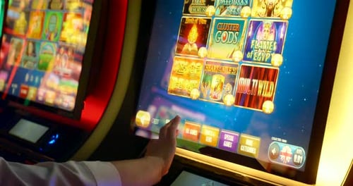 Batumi, Georgia - August 15 2023: Slider shot of modern casino slot machines