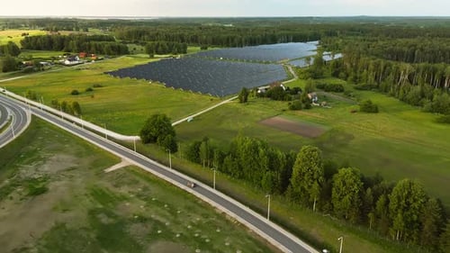 A Solar Farm in a Rural Landscape Showcases Renewable Energy and Sustainability in a Natural Setting