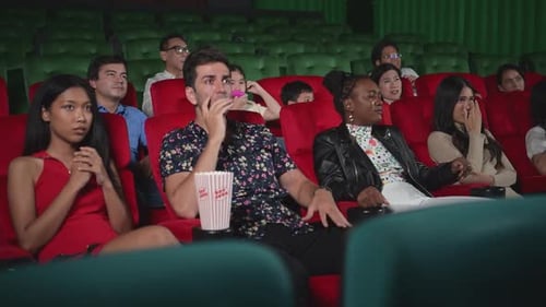 People react with fear at the movie theater