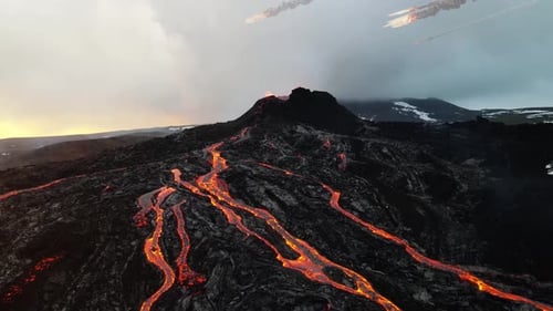 Meteors Asteroids falling from sky over active volcano, Aerial view