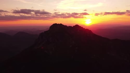 A Beautiful Sunset Over a Rocky Mountain
