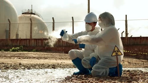 Scientists in Hazmat Suits Collect Water Samples