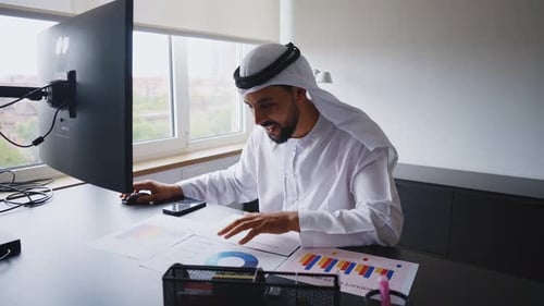 businessman working in a modern office in the united arab emirates.