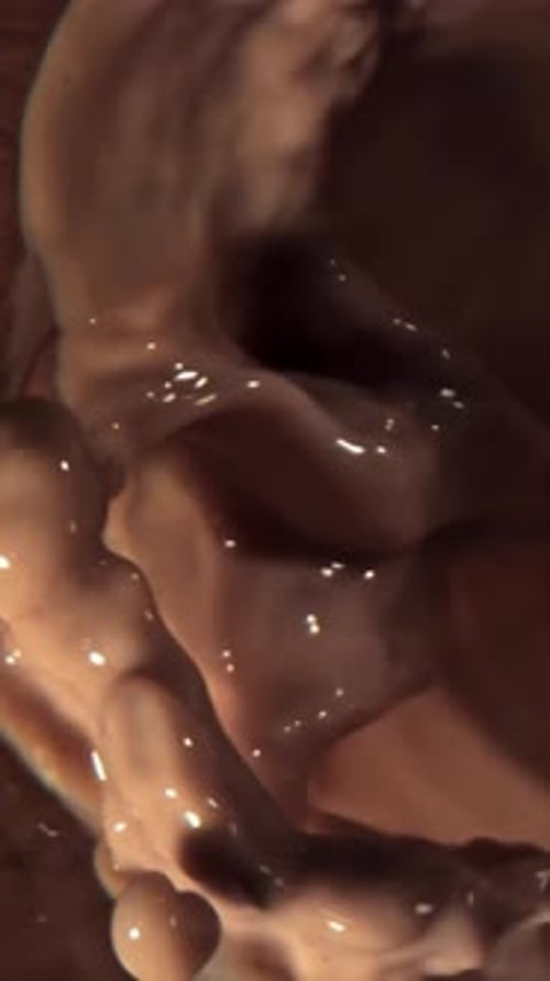 Hot Chocolate is Poured Into a Glass Filmed on a Highspeed Camera at 1000 Fps