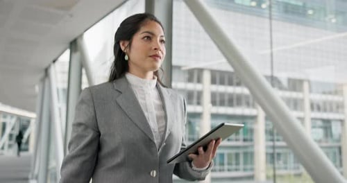 Tablet, walking and happy business woman in office online for communication