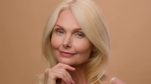 Portrait Beautiful Old Woman Perfect Face Mature Caucasian Senior Middle Age Female in Beige Studio