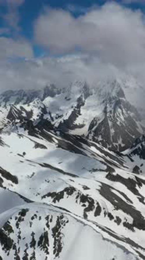 Snowy Mountain Peaks Aerial View