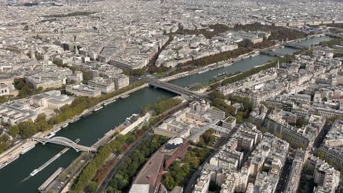Aerial View of Paris with Seine River and Bridges Overhead Shot Capturing the Seine River Weaving