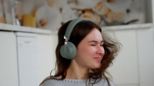 Woman Listening to Music with Headphones