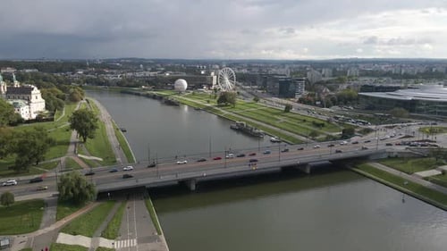 Aerial shot of traffic circulation over a bridge in krakow poland on an overcast day
