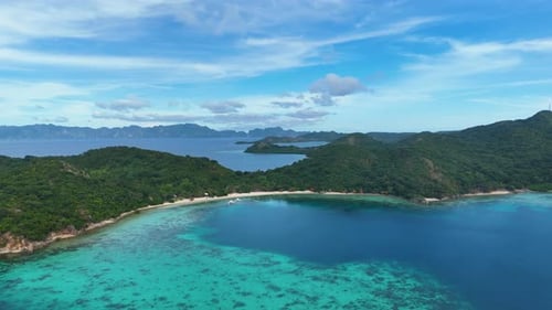 Stunning drone shot of Coco Beach, capturing the serene coastline and lush tropical scenery.