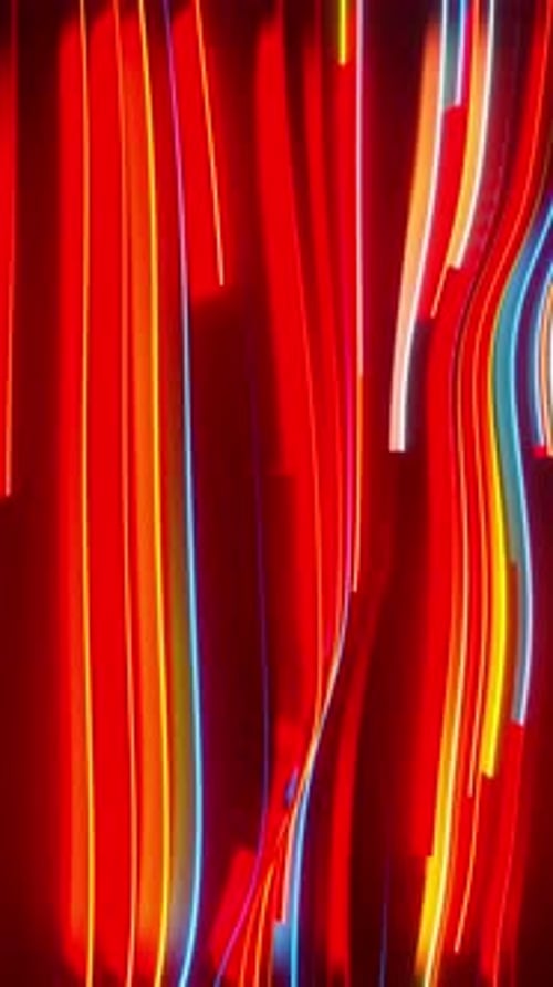 Vertical Colored lines run along the wave. The wave runs and shimmers with an endless gradient. Abst