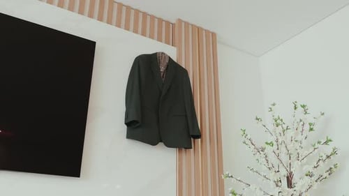 Blazer Hanging on Wall in Clean Modern Home Interior