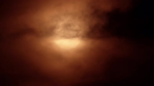 TimeLapse Of Sunrise Over Red Skies And Moving Clouds