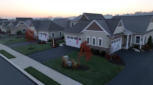 Aerial View of Suburban Houses at Sunrise