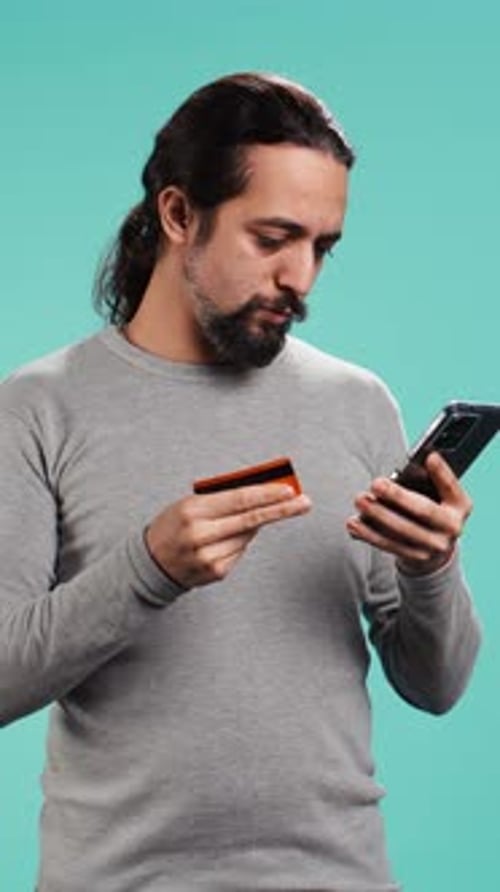 Young Adult with Credit Card and Smartphone