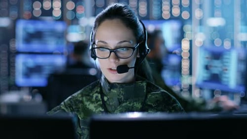 Woman Working in a Military Command Center