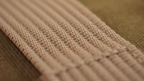 Fond de texture de tissu marron, motif sans couture de textile naturel